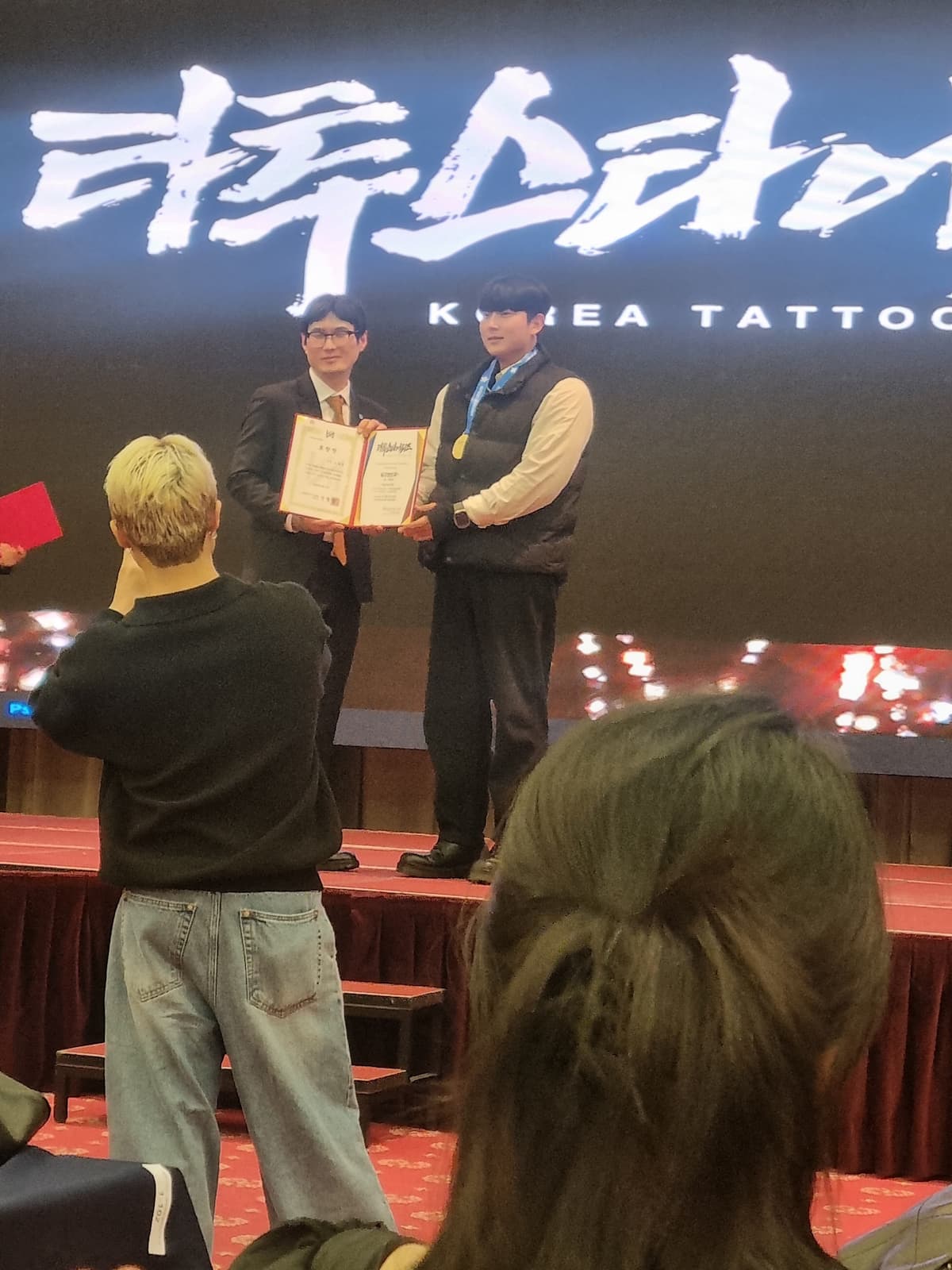 Certificate presentation at the TattooStar Awards